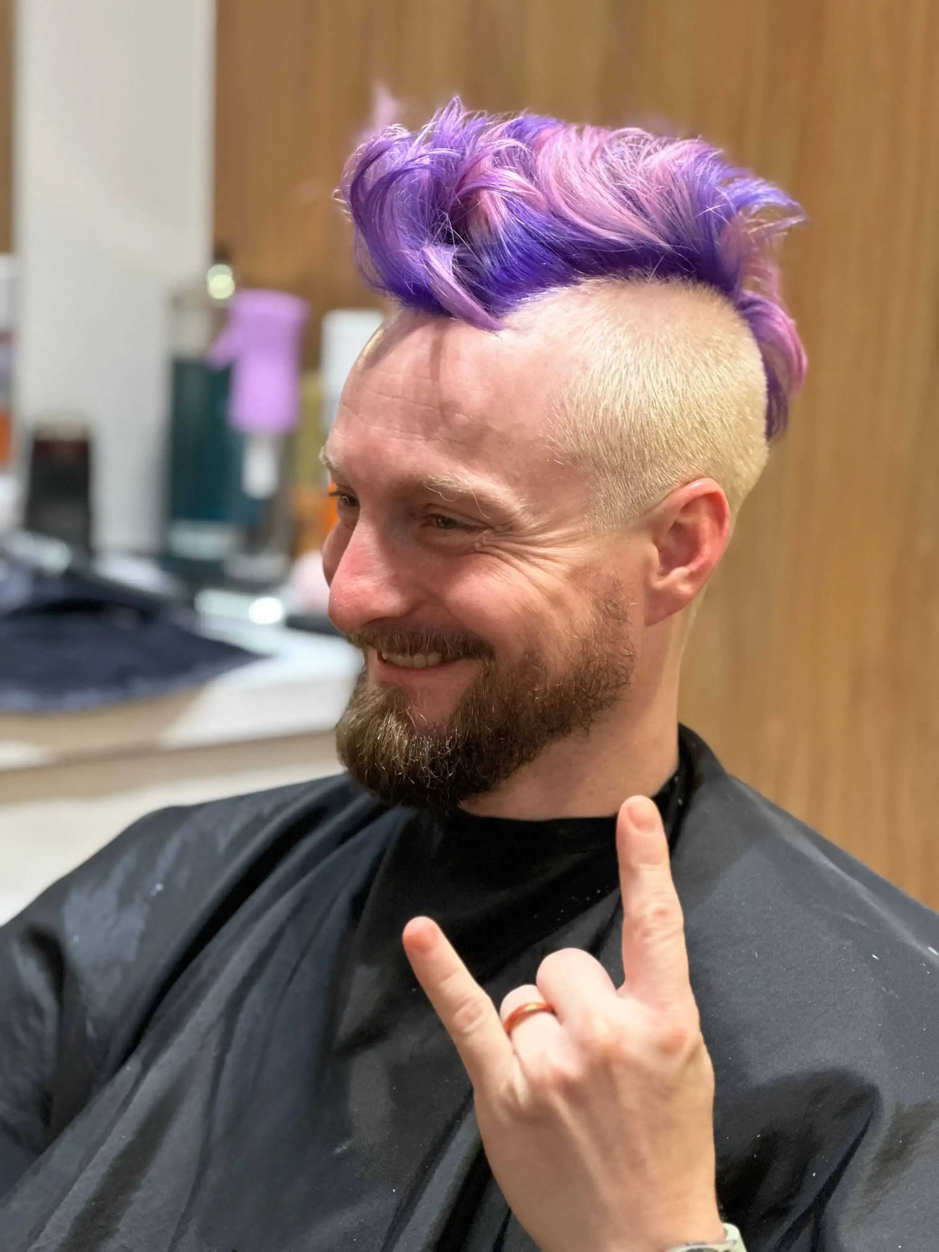 A vibrant, modern men's bleach and tone hairstyle