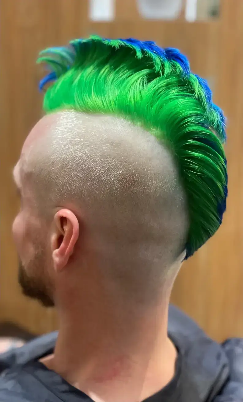 A man's hair after a single process full hair color service to cover grey